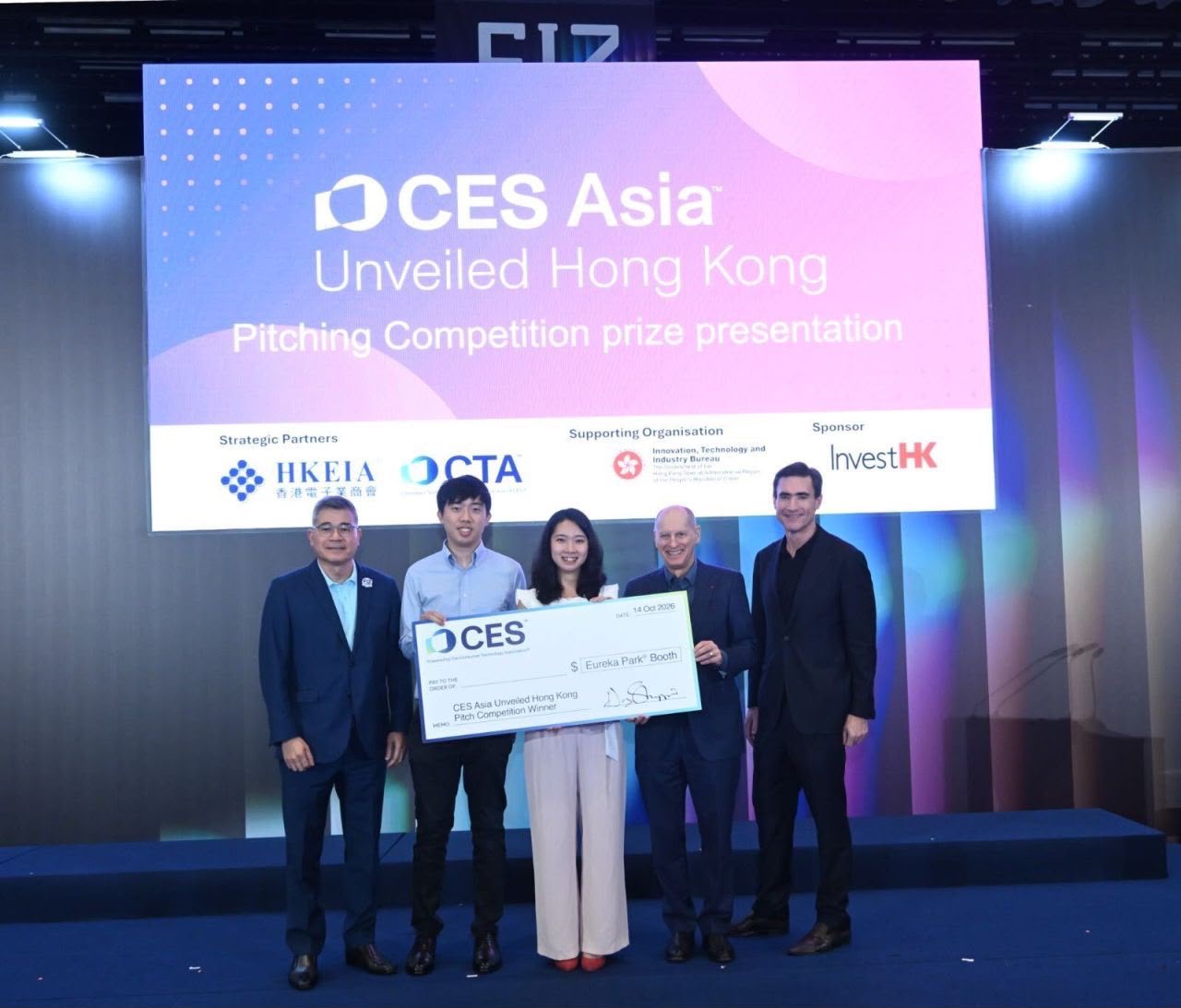Wendy Lam and fellow winners on stage at the CES Asia™ Unveiled Hong Kong prize presentation